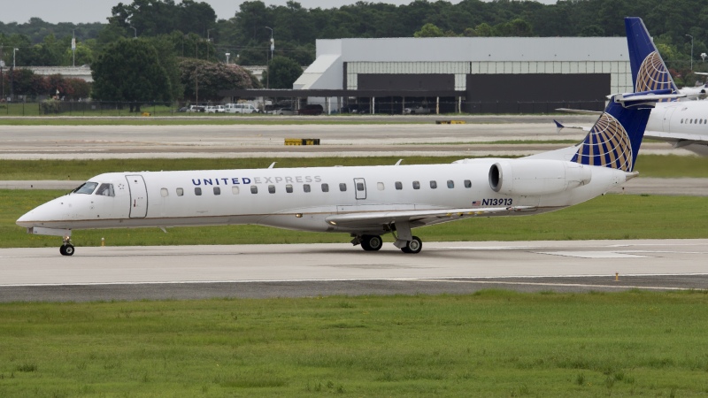 Photo of N13913 - United Express Embraer ERJ145 at IAH on AeroXplorer Aviation Database
