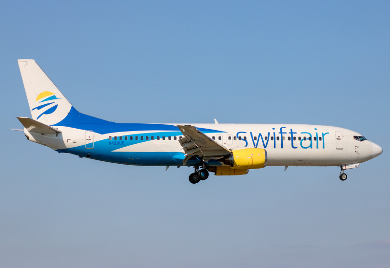 Photo of N420US - Swift Air Boeing 737-400 at MIA on AeroXplorer Aviation Database