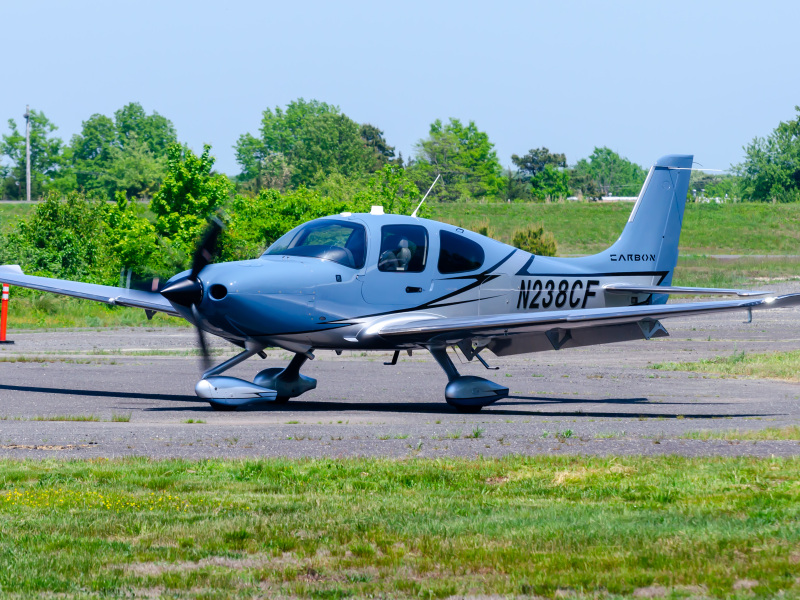 Photo of N238CF - PRIVATE Cirrus SR-22 at BLM on AeroXplorer Aviation Database