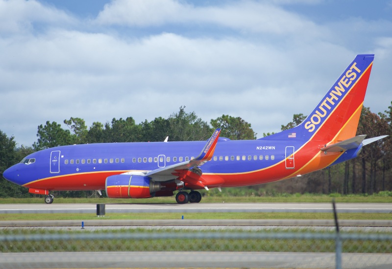 Photo of N242WN - Southwest Airlines Boeing 737-700 at MCO on AeroXplorer Aviation Database