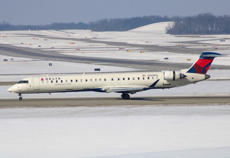 Photo of N329PQ - Delta Airlines Mitsubishi CRJ-900 at CVG on AeroXplorer Aviation Database