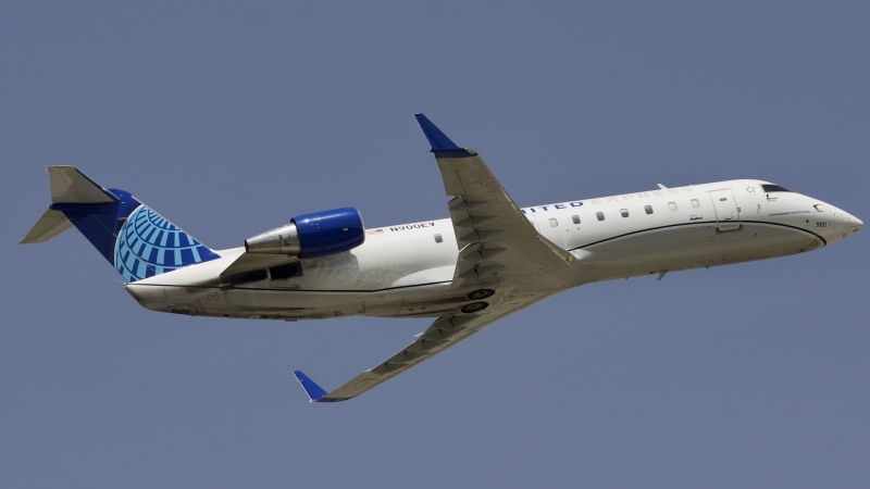 Photo of N900EV - United Express Mitsubishi CRJ-200 at IAH on AeroXplorer Aviation Database