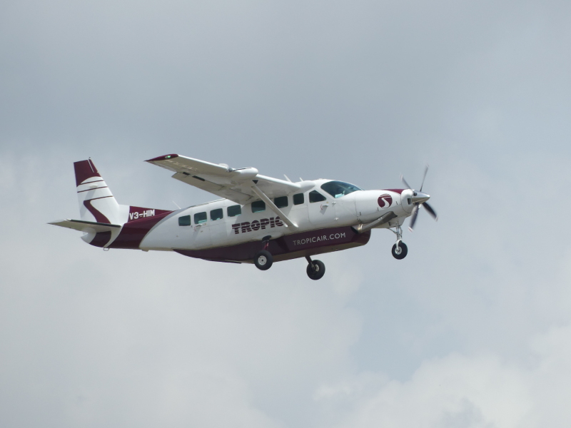 Photo of V3-HIM - Tropic Air  Cessna 208 Grand Caravan at BZE on AeroXplorer Aviation Database
