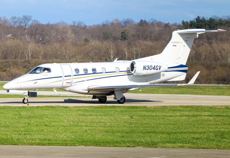 Photo of N304GV - PRIVATE  Embraer Phenom 300 at LUK on AeroXplorer Aviation Database
