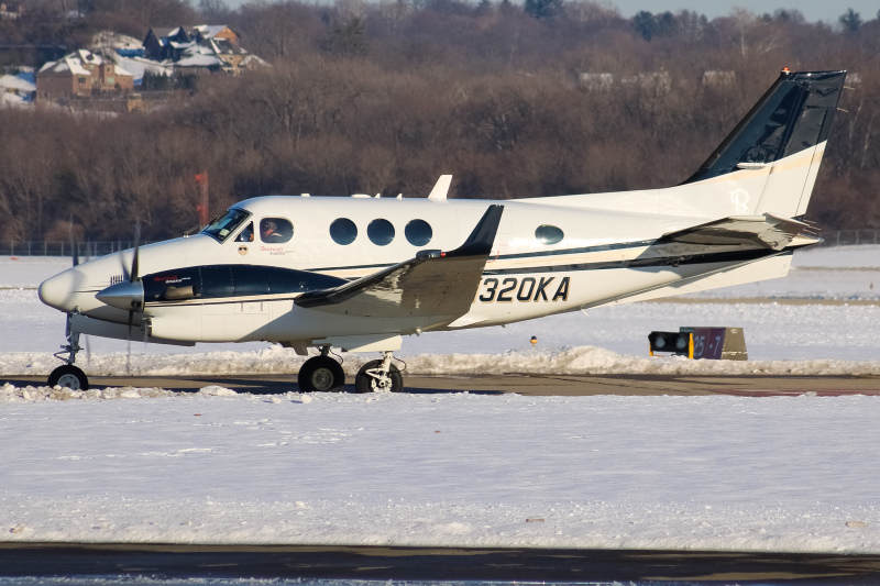 Photo of N320KA - PRIVATE  Beechcraft King Air C90 at LUK on AeroXplorer Aviation Database