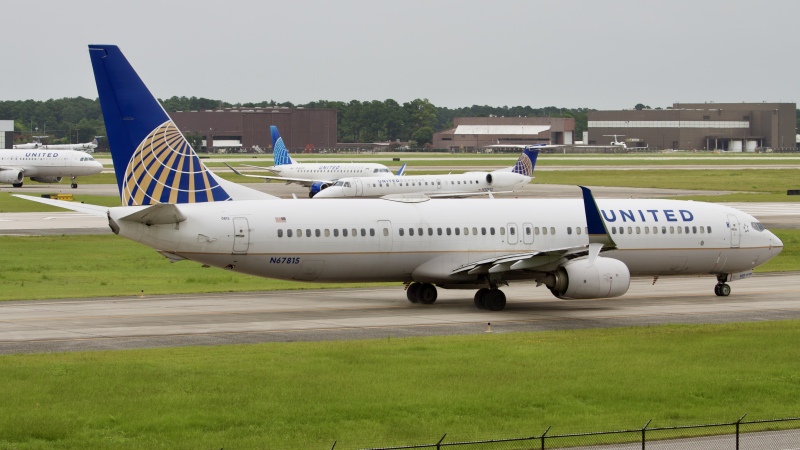 Photo of N67815 - United Airlines Boeing 737-900ER at IAH on AeroXplorer Aviation Database