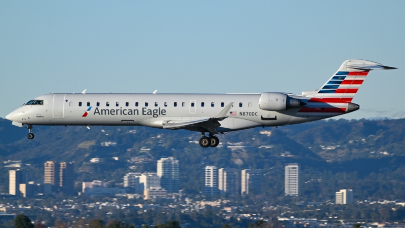 Photo of N870DC - SkyWest Airlines Mitsubishi CRJ-700 at LAX on AeroXplorer Aviation Database