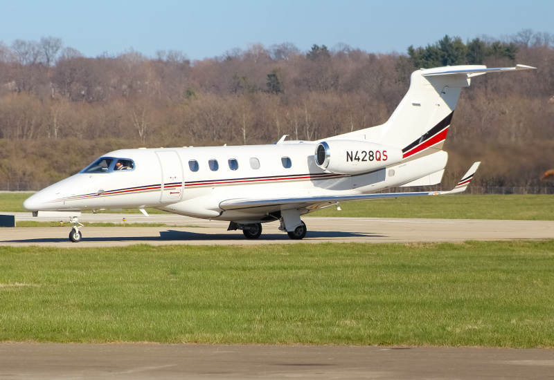 Photo of N428QS - NetJets Embraer Phenom 300 at LUK on AeroXplorer Aviation Database