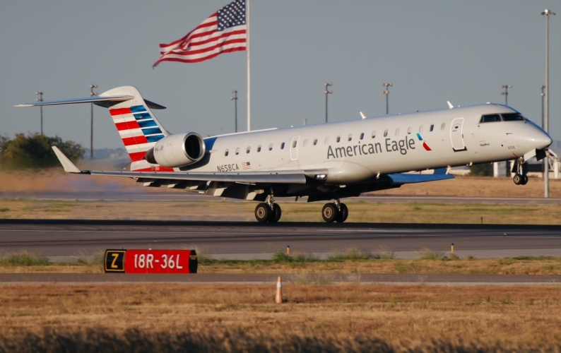 Photo of N658CA - SkyWest Airlines Mitsubishi CRJ-700 at DFW on AeroXplorer Aviation Database