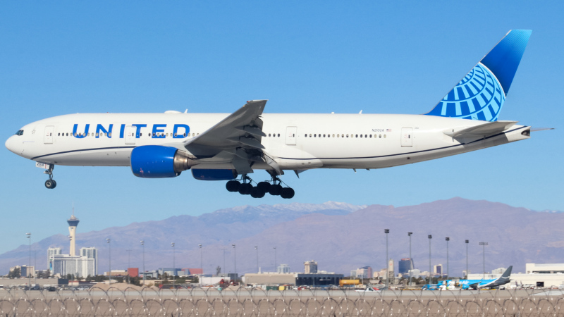 Photo of N210UA - United Airlines Boeing 777-200 at LAS on AeroXplorer Aviation Database