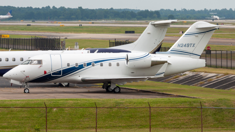 Photo of N249TX - PRIVATE Bombardier Challenger 604 at IAH on AeroXplorer Aviation Database