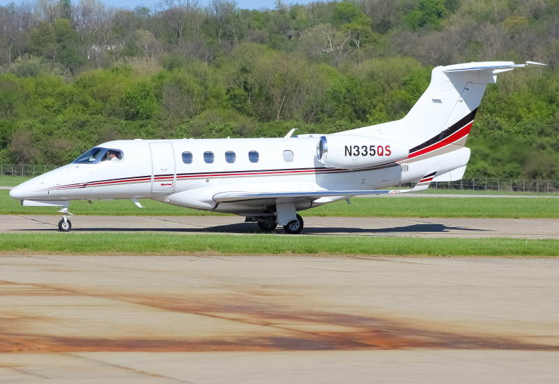 Photo of N335QS - NetJets Embraer Phenom 300 at LUK on AeroXplorer Aviation Database