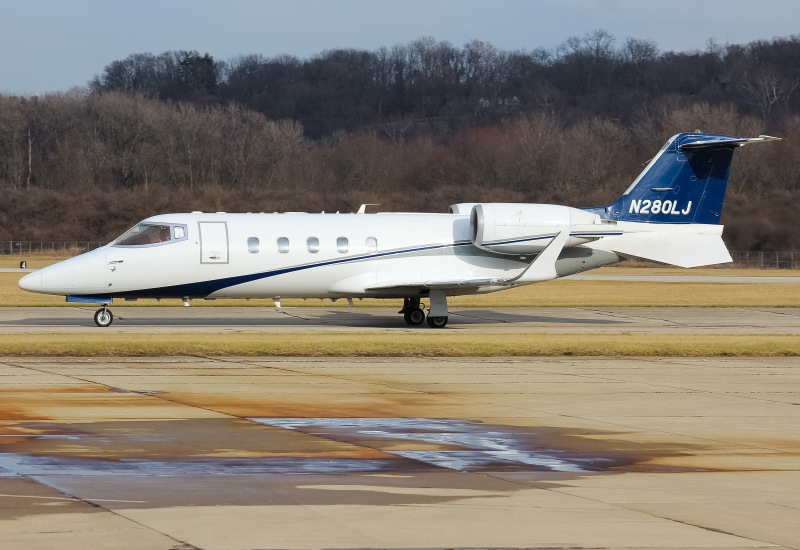 Photo of N280LG - PRIVATE  Learjet 60 at LUK on AeroXplorer Aviation Database