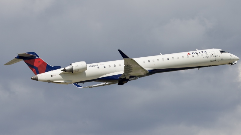 Photo of N820SK - Delta Connection Mitsubishi CRJ-900 at IAH on AeroXplorer Aviation Database