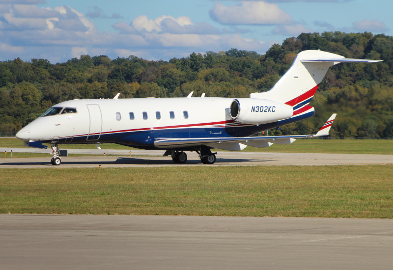 Photo of N302KC - PRIVATE Bombardier Challenger 300 at LUK on AeroXplorer Aviation Database