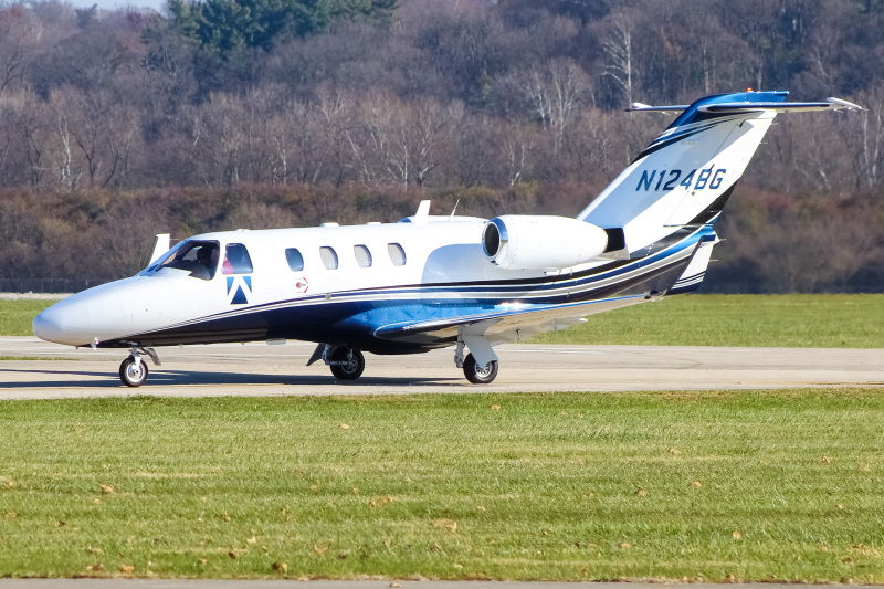 Photo of N124BG - PRIVATE Cessna Citation CJ1 at LUK on AeroXplorer Aviation Database