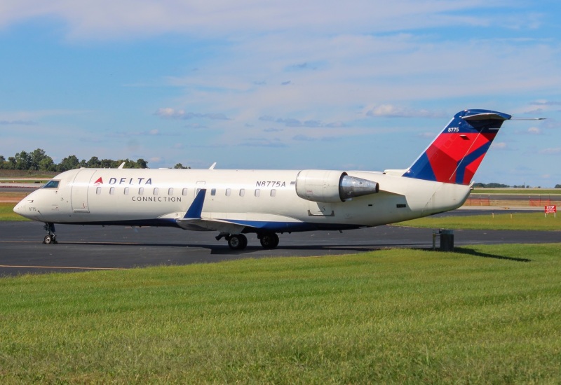 Photo of N8775A - Delta Connection Mitsubishi CRJ-200 at CVG on AeroXplorer Aviation Database