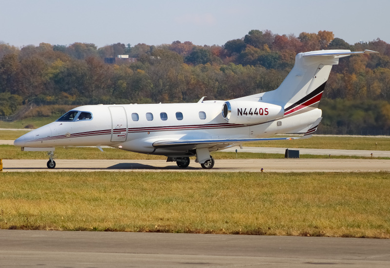 Photo of N444QS - NetJets Embraer Phenom 300 at LUK on AeroXplorer Aviation Database