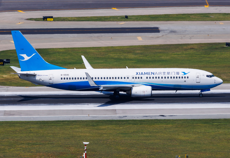Photo of B-5595 - Xiamen Air Boeing 737-800 at HKG on AeroXplorer Aviation Database