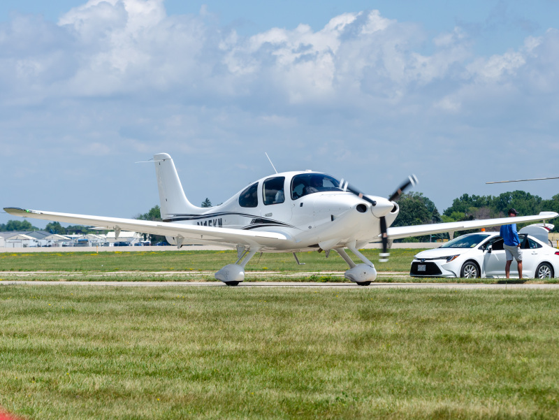 Photo of N15KM - PRIVATE Cirrus SR-20 at OSH on AeroXplorer Aviation Database