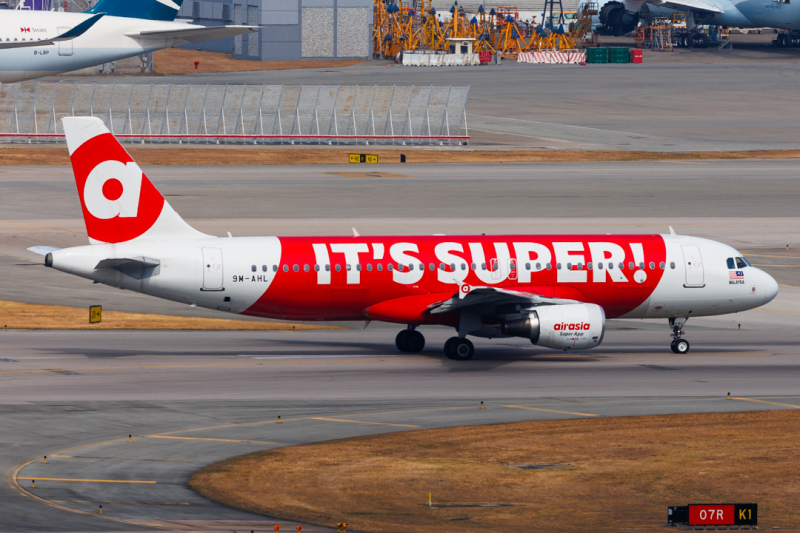 Photo of 9M-AHL - AirAsia Airbus A320 at HKG on AeroXplorer Aviation Database