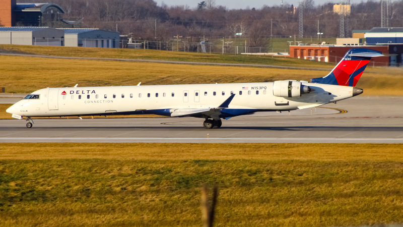 Photo of N153PQ - Delta Connection Mitsubishi CRJ-900 at CVG on AeroXplorer Aviation Database