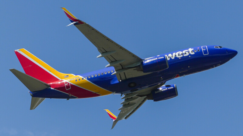 Photo of N7748A - Southwest Airlines Boeing 737-700 at BZE on AeroXplorer Aviation Database