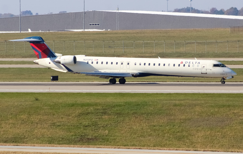 Photo of N313PQ - Delta Connection Mitsubishi CRJ-900 at CVG on AeroXplorer Aviation Database