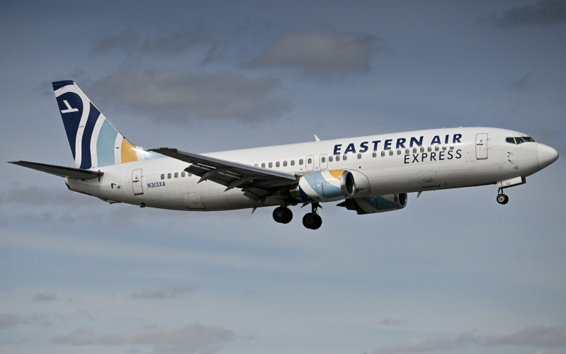 Photo of N313XA - Eastern Air Express Boeing 737-400 at MIA on AeroXplorer Aviation Database