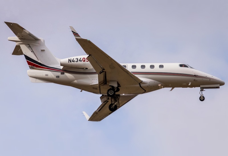 Photo of N434QS - NetJets Embraer Phenom 300 at IAD on AeroXplorer Aviation Database