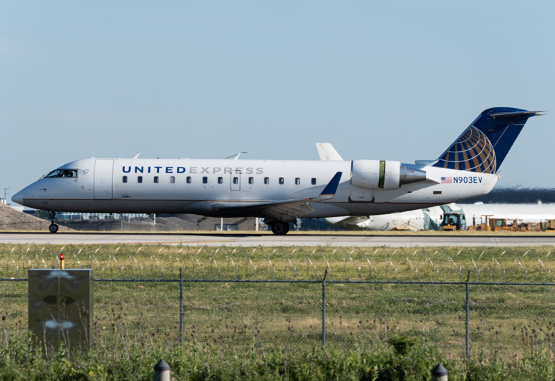 Photo of N903EV - United Express Mitsubishi CRJ-200 at ORD on AeroXplorer Aviation Database