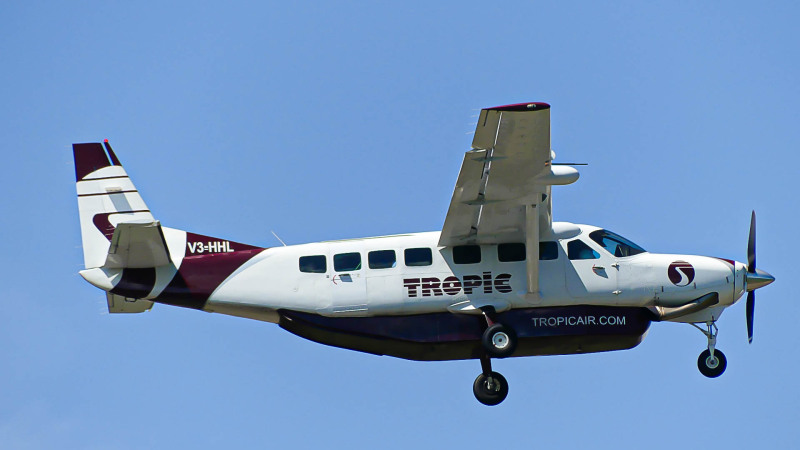 Photo of V3-HHL - Tropic Air  Cessna 208 Grand Caravan at BZE on AeroXplorer Aviation Database