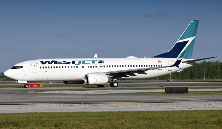 Photo of C-GWWJ - WestJet Boeing 737-800 at MCO on AeroXplorer Aviation Database