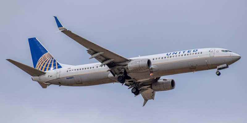 Photo of N68811 - United Airlines Boeing 737-900 at DEN on AeroXplorer Aviation Database