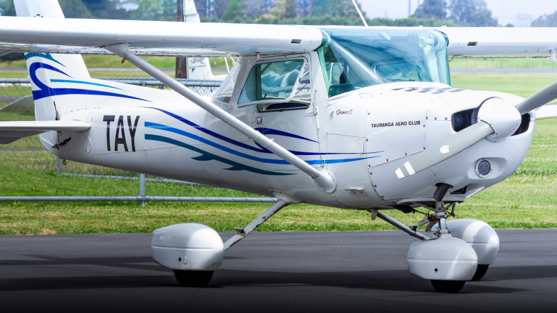 Photo of ZK-TAY - Tauranga Aero Club Cessna 152 at TRG on AeroXplorer Aviation Database