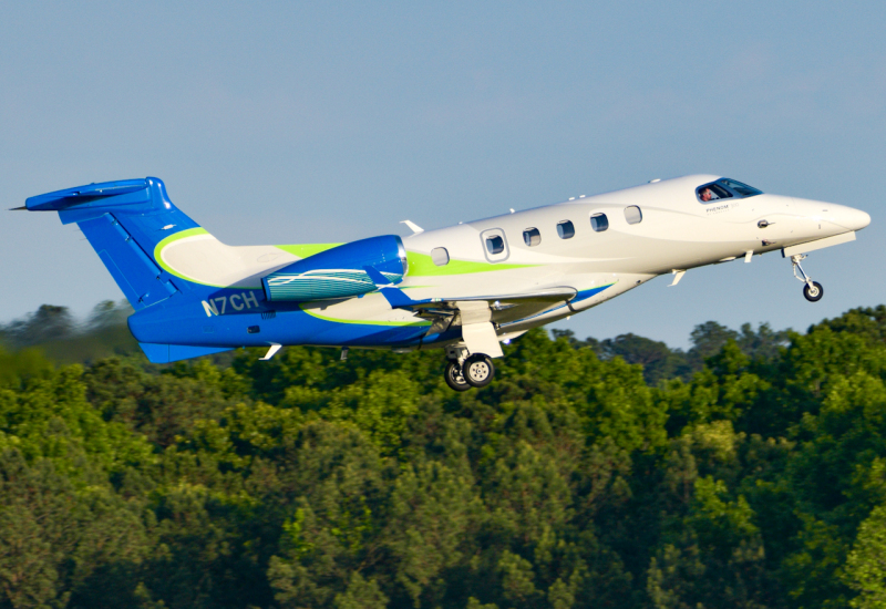 Photo of N7CH - PRIVATE Embraer Phenom 300 at RDU on AeroXplorer Aviation Database
