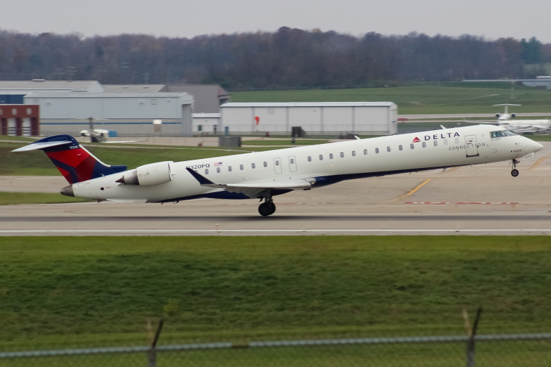 Photo of N320PQ - Delta Connection Mitsubishi CRJ-900 at CVG on AeroXplorer Aviation Database