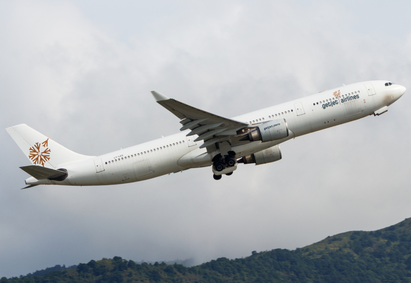 Photo of LY-LEO - GetJet Airlines Airbus A330-300 at HKG on AeroXplorer Aviation Database