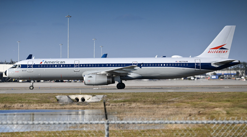 Photo of N579UW - American Airlines Airbus A321-200 at MCO on AeroXplorer Aviation Database