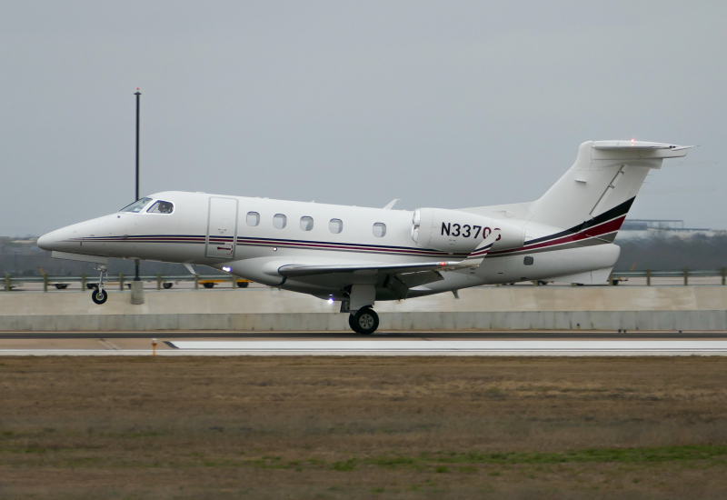 Photo of N337QS - NetJets Embraer Phenom 300 at AUS on AeroXplorer Aviation Database