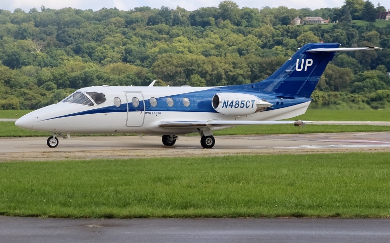 Photo of N485CT - Wheels Up Beechcraft Hawker 400 at LUK on AeroXplorer Aviation Database