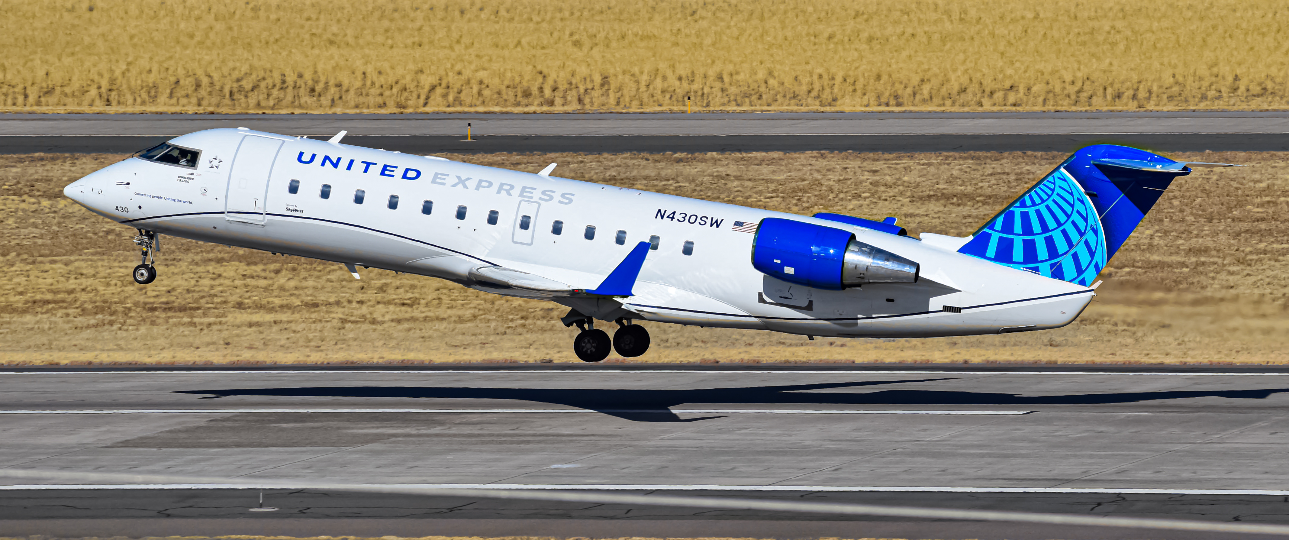 Photo of N430SW - United Express Mitsubishi CRJ-200 at DEN